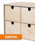 Four-drawer wooden storage box with finger pull handles.