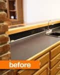 Wooden kitchen counter with black countertop, small sink, and coffee maker, labeled "before" in orange.
