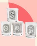 Five Diptyque candles labeled Mimosa, Baies, Feu de Bois, Roses, and Figuier on a geometric background.