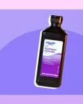 Hydrogen peroxide bottle with purple label on a purple and pink background.