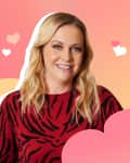 Woman in a red and black patterned top smiling against a pink and orange background with heart graphics.