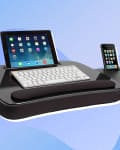 lap desk with iPad, key board and iPhone