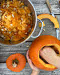 Pumpkin being carved.