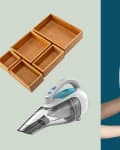 Bamboo drawer organizers, handheld vacuum, and hands holding a green vase with white flowers.