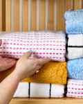 head on shot of assorted towels folded on a shelf