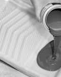 overhead shot of someone pouring paint into the paint tray