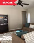 Living room with beige sofas, teal and white pillows, checkered throw, dark bookshelf, and ceiling fan.