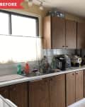 Cluttered kitchen with brown cabinets, white fridge, and various items on the counter, including a coffee maker and cleaning supplies.