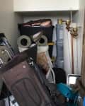 Before: Beige nook full of sports equipment and other random storage