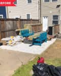 Before: small backyard with limited patio space and two blue benches