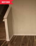 Before: Awkward empty nook with wood floors and blank wall
