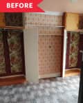 Empty room with open closets, vintage floral wallpaper, and speckled carpet.
