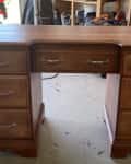 Before: Solid wood desk in garage