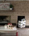 Before: pink-beige stone fireplace with a black stone hearth