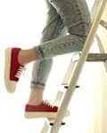 girl climbing a step ladder