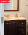 Before: Bathroom with dark wood vanity and white walls