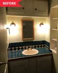 Before: Dark green-painted bathroom with tiled vanity