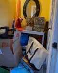 Before: Cluttered entryway at front door