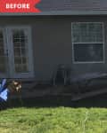 Before: exterior of house with grassy backyard and tiny patio