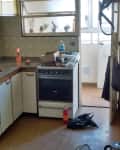 Before: Run-down and dated kitchen