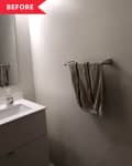 Before: Plain powder room with white walls