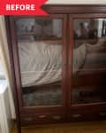 Before: Dark wood glass-front cabinet