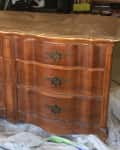 Before: brown wood dresser with six drawers