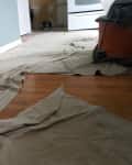 Before: Drop cloth on oak floors