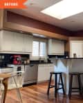 Before: Kitchen with brown walls, clunky bulkhead, and island with too-low barstools