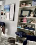 Before: gray walls with white book shelf and two white desks