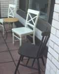 Before: Mismatched chairs on balcony