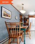 Before: a dining table in a blue kitchen with brown cabinets