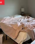 Before: an unmade bed with pink sheets