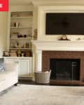 Before: a white living room with a brick fireplace and a white mantle
