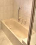 A white bathroom with sink and bathroom.