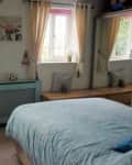 Blue bedroom before renovation.