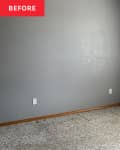 Blue painted walls in bedroom before renovation.