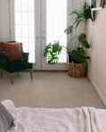 white bedroom with gray carpet and french doors before makeover
