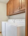 Washer and dryer in laundry room before renovation.