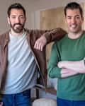 the Property Brothers, standing in a room together