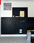 Originally a garage, an unused playroom went from junk room to shared office space.