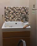 Bathroom vanity area before renovation.