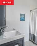 Bathroom with a white shower curtain, gray cabinetry, a double sink, and a jetted tub against a white tiled wall.