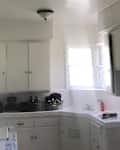 White kitchen before renovation.
