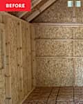 Empty wooden shed interior with OSB walls, exposed beams, and a window, featuring shelves along one wall.