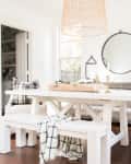 Dining room featuring a white table and benches