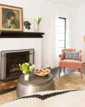 a black and white mantel that displays only a framed piece of art