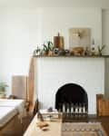 White brick fireplace with candles