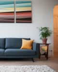 A living room featuring a blue sofa