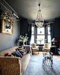 black living room features Victorian decor
